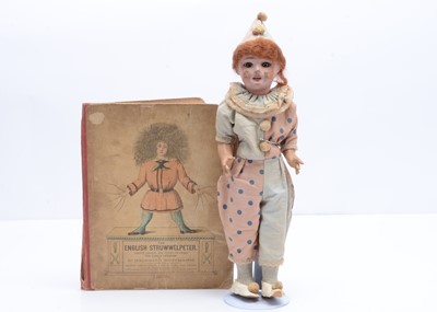 Lot 1004 - A French papier-mâché headed clown doll