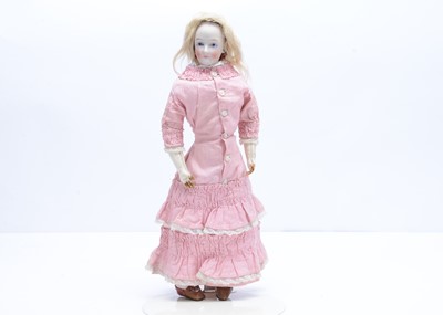 Lot 1021 - A small Jumeau swivel head fashionable doll