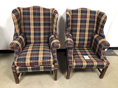 Lot 340 - A pair of modern upholstered wing back armchairs