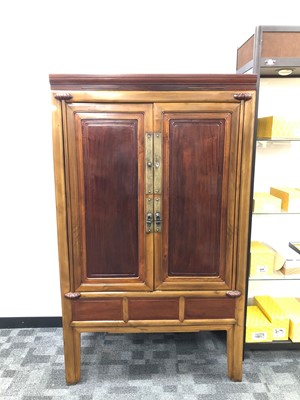 Lot 341 - A modern Chinese hardwood wardrobe