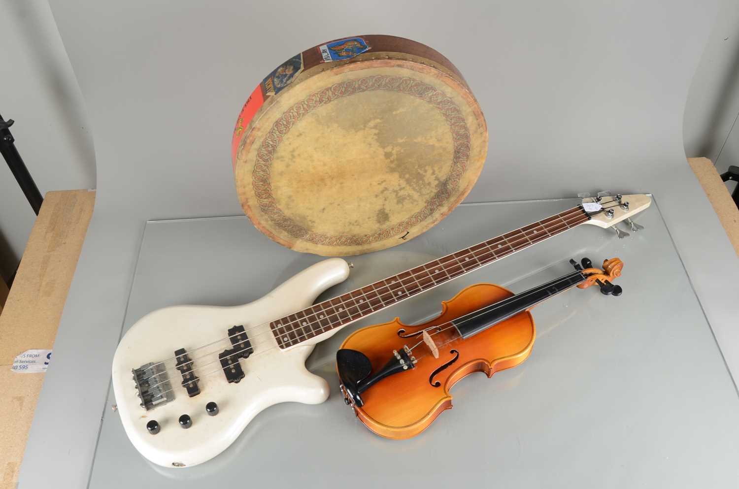 Lot 532 - Bass Guitar / Violin / Hand Drum,