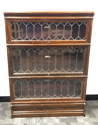 Lot 347 - A Globe Wernicke & Co. stained oak stackable bookcase