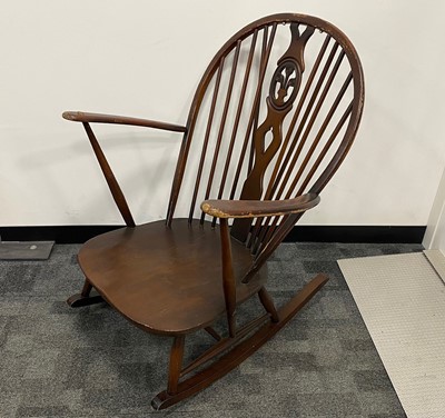 Lot 353 - A second half 20th century stained beech rocking chair