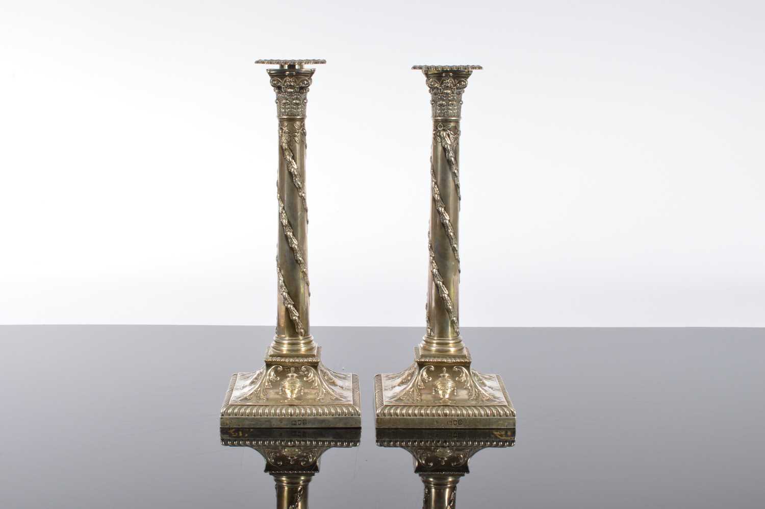 Lot 112 - A good pair of Victorian silver filled candlesticks