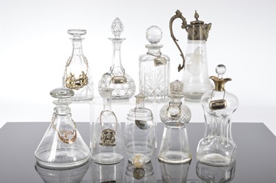 Lot 138 - Eight various glass decanters and a Claret jug