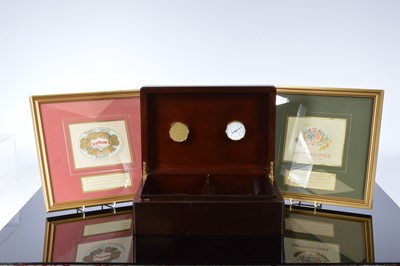 Lot 139 - A modern wooden cigar humidor and various cigars and two framed cigar labels