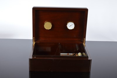 Lot 139 - A modern wooden cigar humidor and various cigars and two framed cigar labels