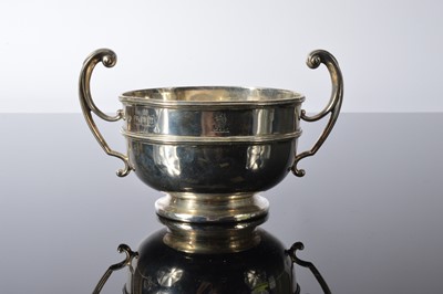 Lot 172 - A George V silver twin handled footed bowl from Goldsmiths & Silversmiths