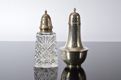 Lot 176 - An Art Deco period silver sugar sifter and a cut glass sifter with silver lid