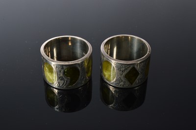 Lot 177 - A pair of nice Edwardian silver and hardstone inlaid napkin rings by H.G & S