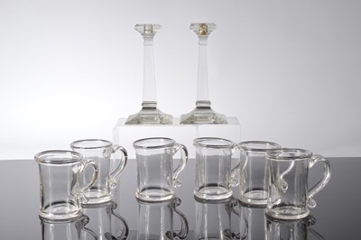 Lot 192 - A pair of glass candlesticks and a set of six glass tankards