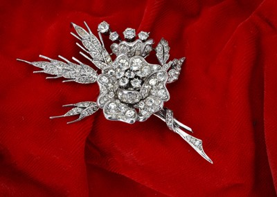 Lot 227 - A silver and paste set floral spray brooch