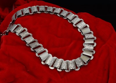 Lot 229 - A Victorian silver engraved flattened linked necklace