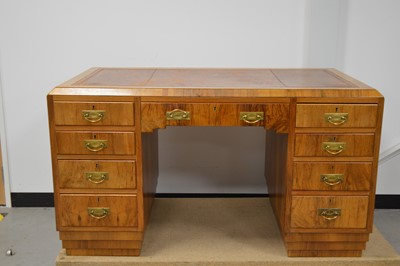 Lot 385 - An art deco walnut desk