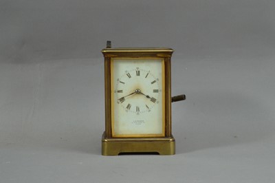 Lot 98 - A late 19th/ early20th century brass carriage clock