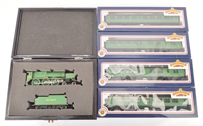 Lot 404 - Bachmann 00 Gauge boxed SR green Lord Nelson Class Locomotive and BR SR malachite green Bulleid Corridor Coaches (5)