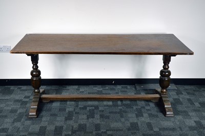 Lot 399 - A reproduction 1920s oak refectory table