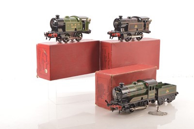 Lot 638 - Three boxed Hornby 0 Gauge post-war clockwork Locomotives and one tender (4)