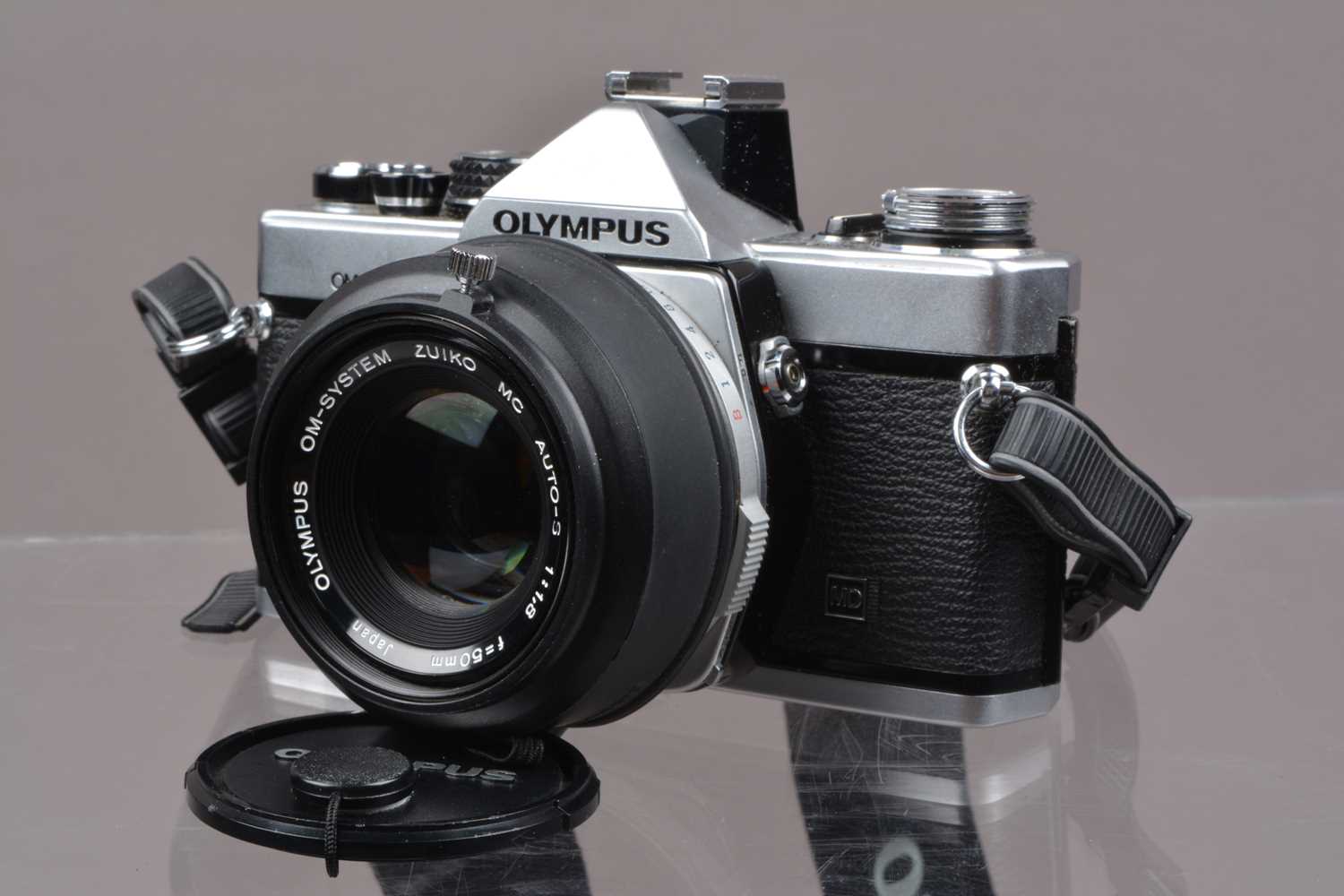 Lot 4 - An Olympus OM-2n MD SLR Camera