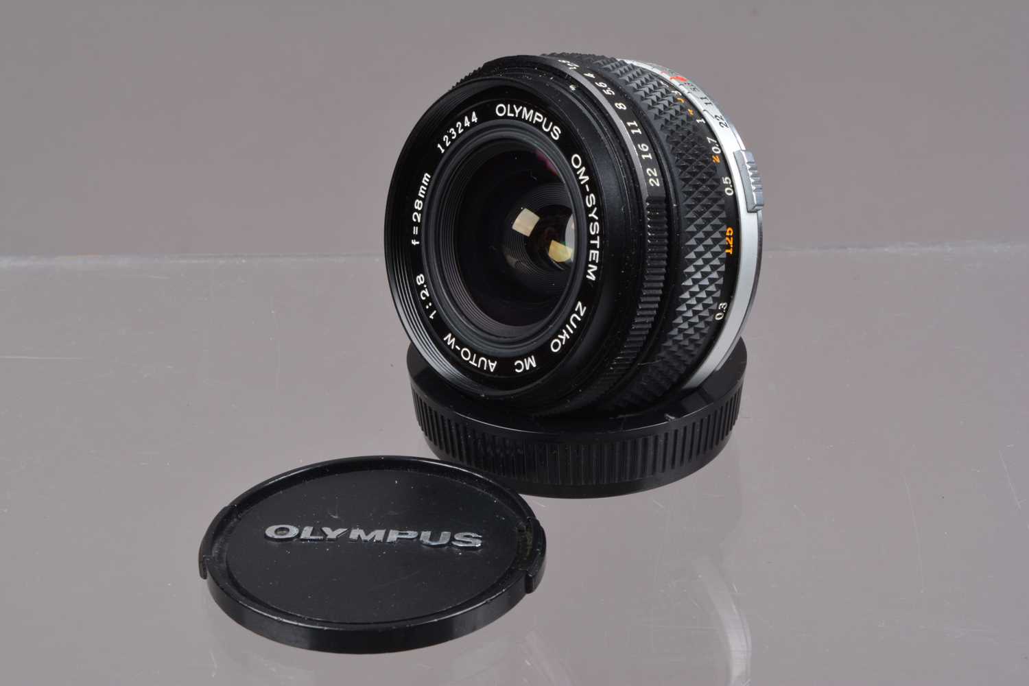 Lot 16 - An Olympus Zuiko 28mm f/2.8 OM Lens