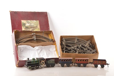 Lot 895 - A boxed Bing 0 Gauge clockwork Train Set and additional rails (2 boxes)