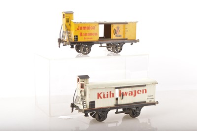 Lot 1128 - Marklin Gauge 1 pair of Continental long wheel base 24cm advertising wagons (2)