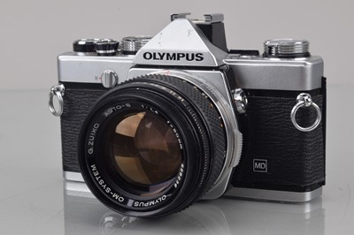 Lot 37 - An Olympus OM-1 SLR Camera