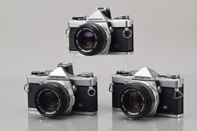 Lot 428 - Three Olympus OM-1n SLR Cameras