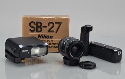 Lot 540 - An AF Nikon Lens and Accessories