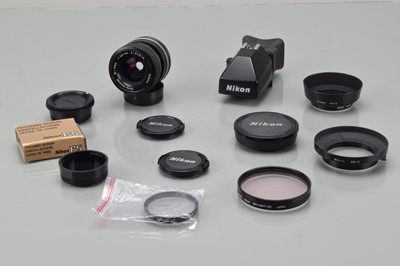 Lot 704 - A Nikon Lens and Accessories