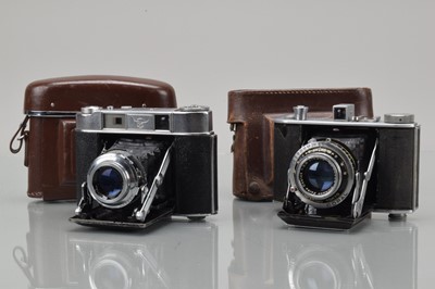 Lot 716 - Two Folding Cameras