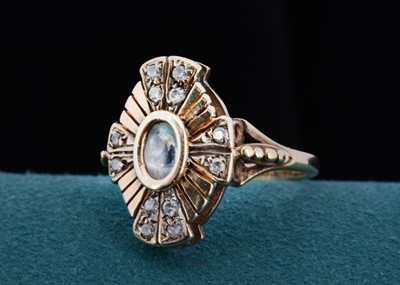 Lot 4 - An art deco style gem set 9ct gold dress ring