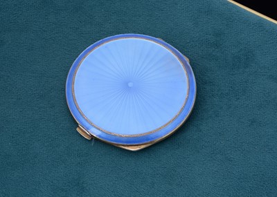 Lot 59 - An art deco silver and guilloche enamel circular compact