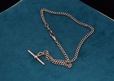 Lot 73 - A 9ct gold curb link watch chain with movable T bar