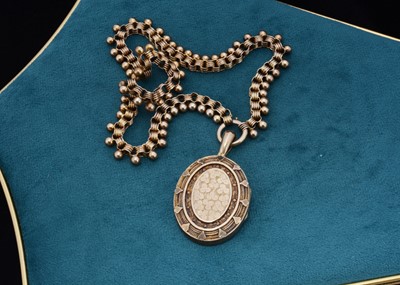 Lot 78 - A Victorian oval shaped hinged locket