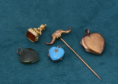 Lot 99 - A 19th Century gold, enamel and seed pearl miniature heart locket