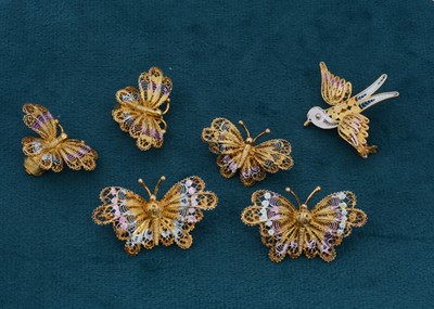 Lot 130 - A collection of five silver gilt filigree butterfly brooches