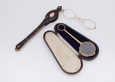 Lot 135 - A late 19th and early 20th century tortoiseshell and gilt metal Lorgnette's