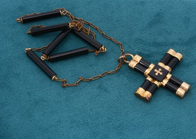 Lot 148 - A 19th century French Jet and gilt metal mourning pendant