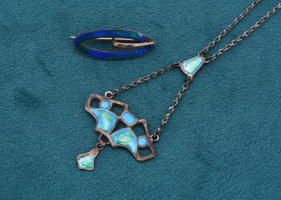 Lot 150 - An Edwardian VII, Art Nouveau silver and enamel pendant and chain