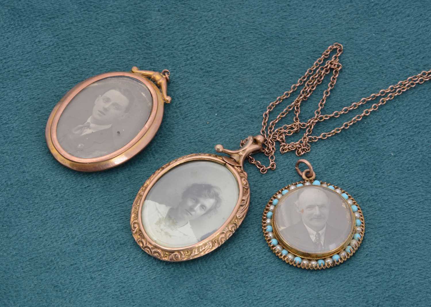 Click H Locket Lot 159 - Three open faced lockets,