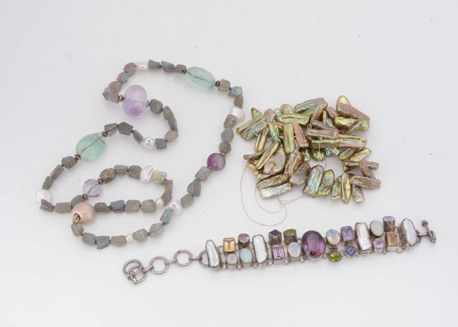 Lot 180 - A contemporary amethyst, fluorite and labradorite necklace