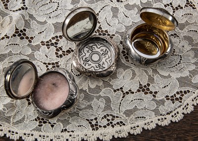 Lot 230 - Three Victorian French silver and silver gilt chatelaine compacts