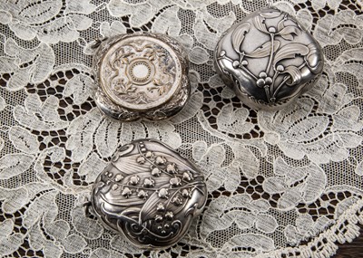 Lot 230 - Three Victorian French silver and silver gilt chatelaine compacts