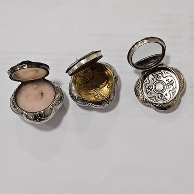 Lot 230 - Three Victorian French silver and silver gilt chatelaine compacts