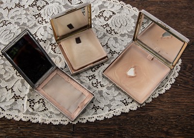 Lot 233 - Three engine turned silver compacts