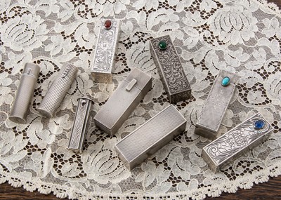 Lot 236 - A collection of silver lipstick holders