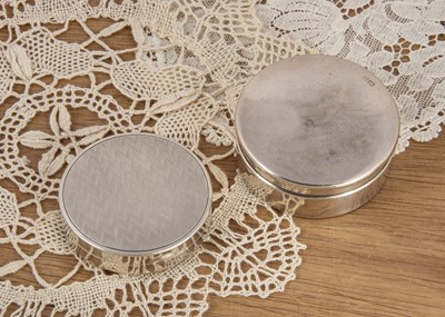 Lot 242 - Two silver circular powder pots