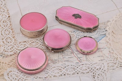 Lot 253 - Five silver and pink guilloche enamel Art Deco compacts