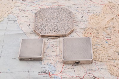 Lot 262 - Three square silver compacts